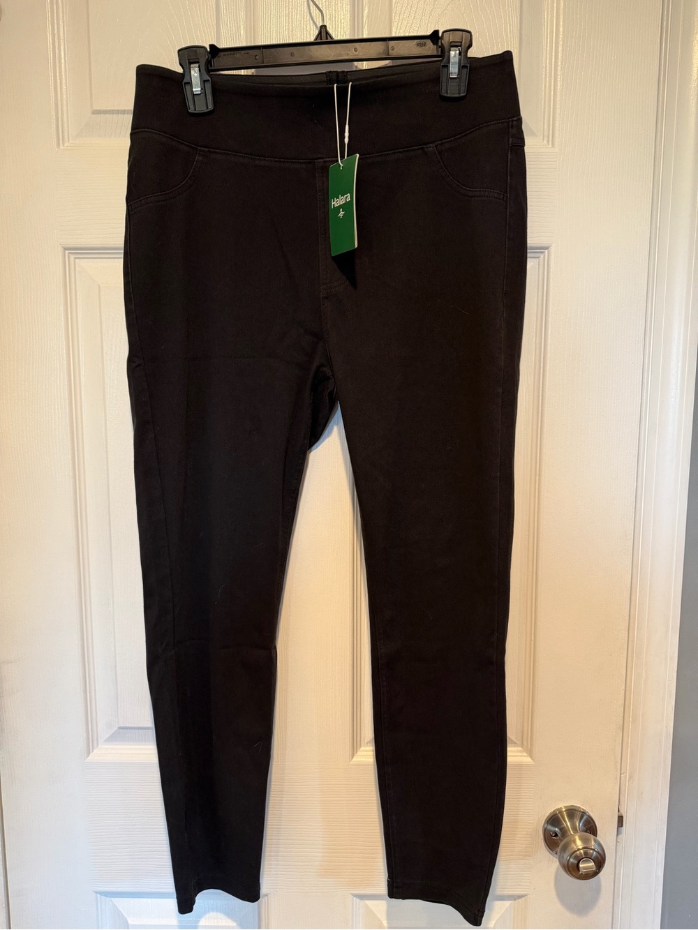 Halara Black high-waisted skinny jeans with a tapered fit